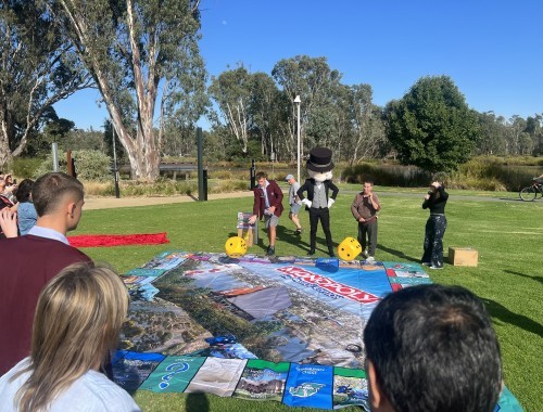 Monopoly Shepparton Edition Launch Victoria Park Lake 19 March 2025 - Rolling to win a game 5733 - web